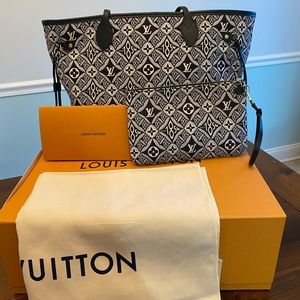 Authentic Louis Vuitton Neverfull MM with Wristlet. Since 1854